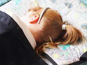 Young child on Kozy Koala Childcare Nap Mat 12