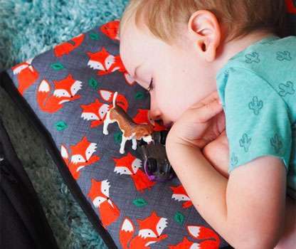 Young child on Kozy Koala Childcare Nap Mat 2